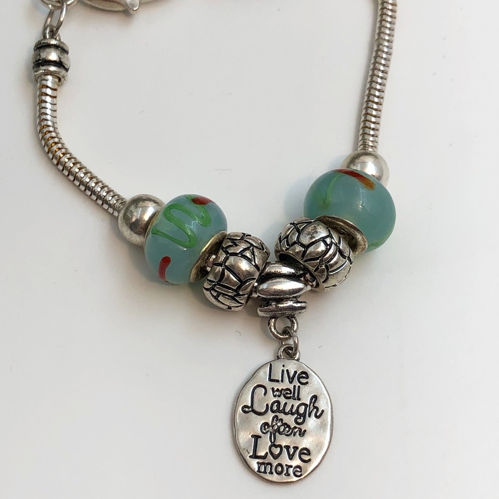 Very Cute Silver Tone Bracelet. 7.5" to 8.0" in Length.